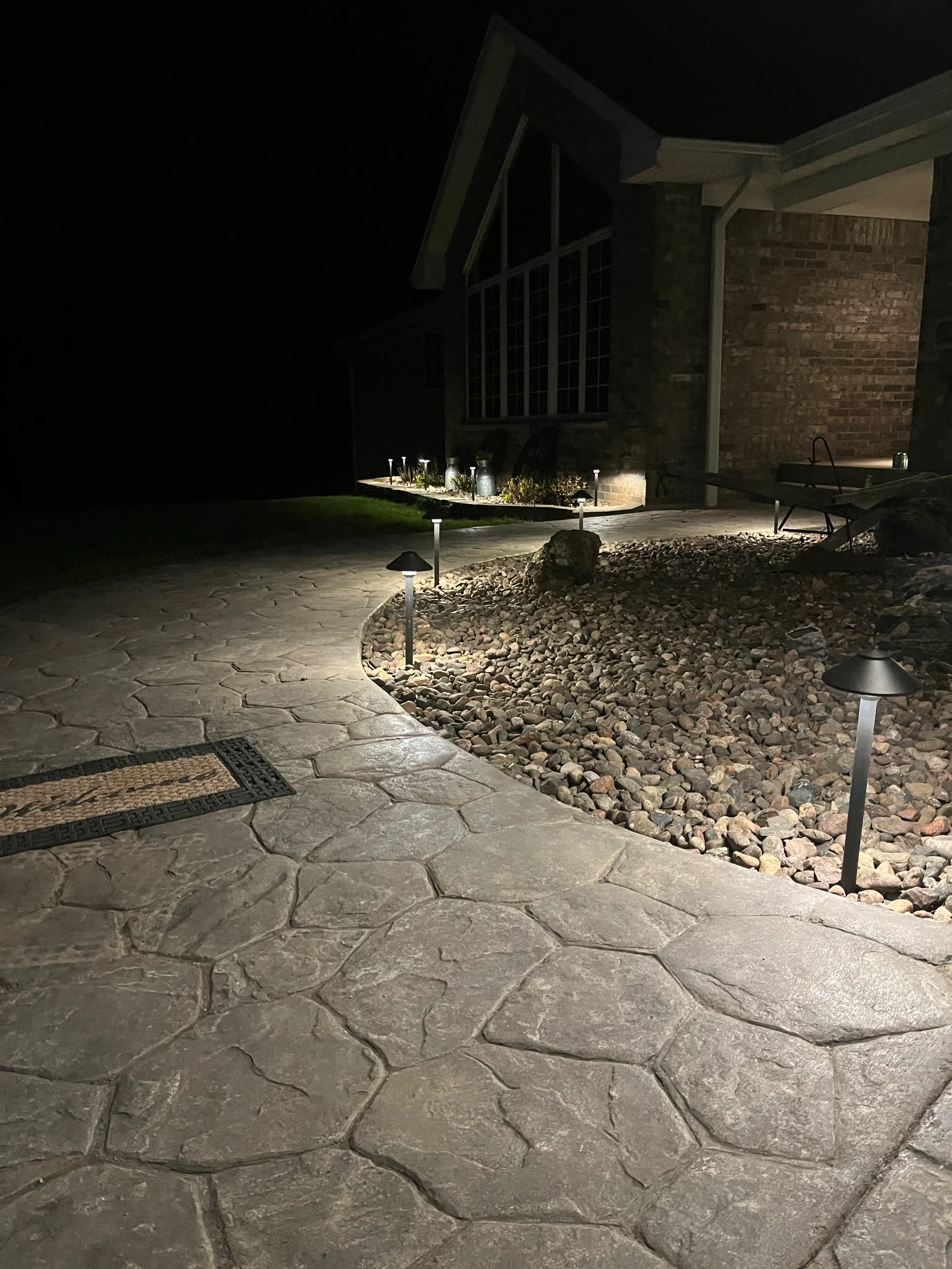 Elegant pathway lighting creating a welcoming entrance to a property